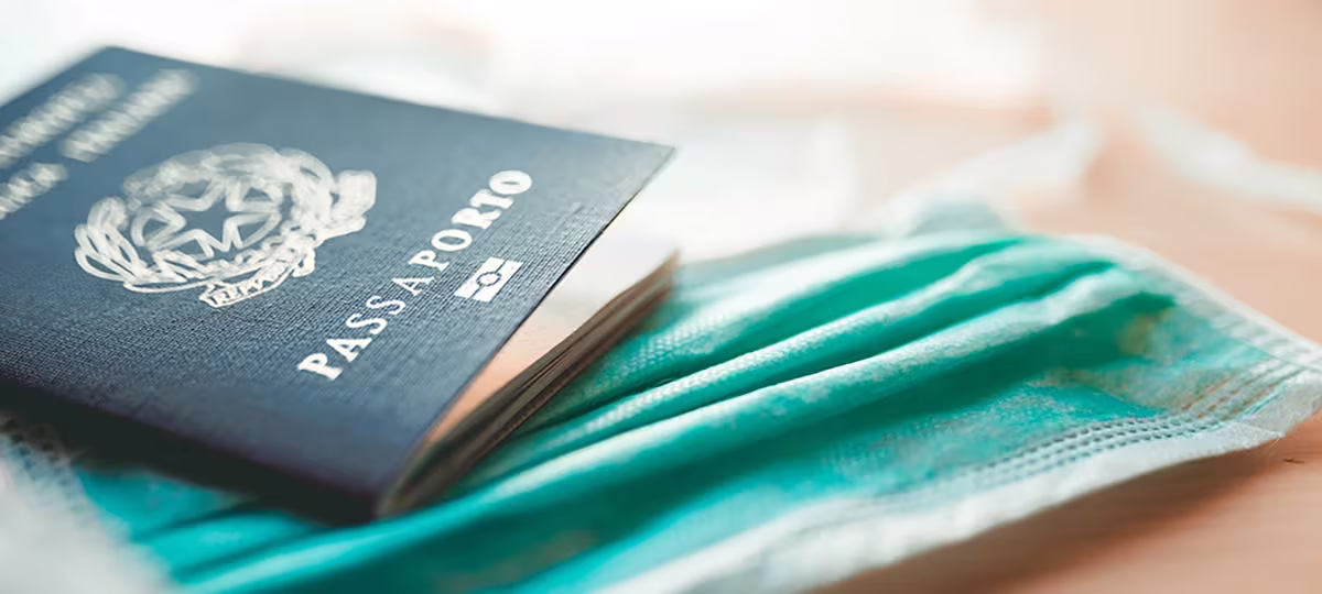 Qnet Vs Travel Fraud And Visa Scams 2 passport on table
