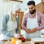 Man and woman preparing food for Ramadan
