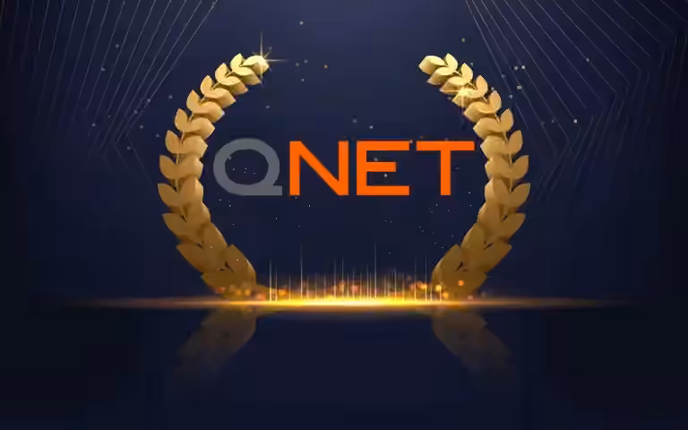 QNET logo inbetween victory ferns for QNET awards