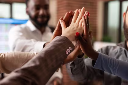 Direct selling industry professionals joining hands