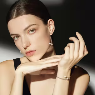 The Timeless Elegance Of Akoya Pearls And Why They’re So Enchanting 4 Woman wearing Greta Earrings and Greta Bangle from the Bernhard H. Mayer Pearl Icons Collection