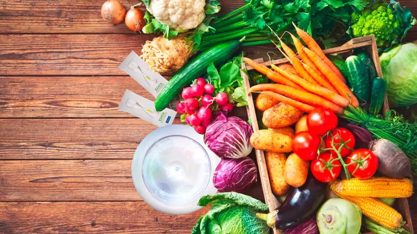 Spread of QNET products with various colourful vegetables show our many options for a vegetarian lifestyle