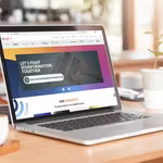 Laptop showing official website to show QNET is a legitimate business and NOT a scam