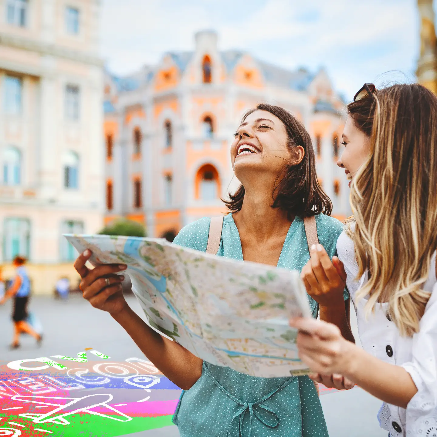 The Real Reason Everyone’s Choosing Package Holidays In 2025 3 two friends hold a map as they enjoy their QVI package holiday experience in a European city